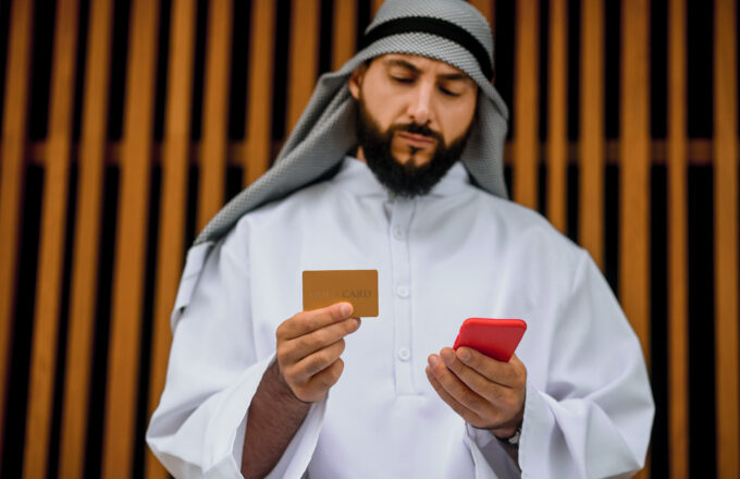 muslim pilgrim checking scam of a fraud agency